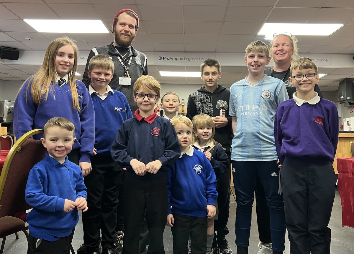 A group of children posing for a picture.